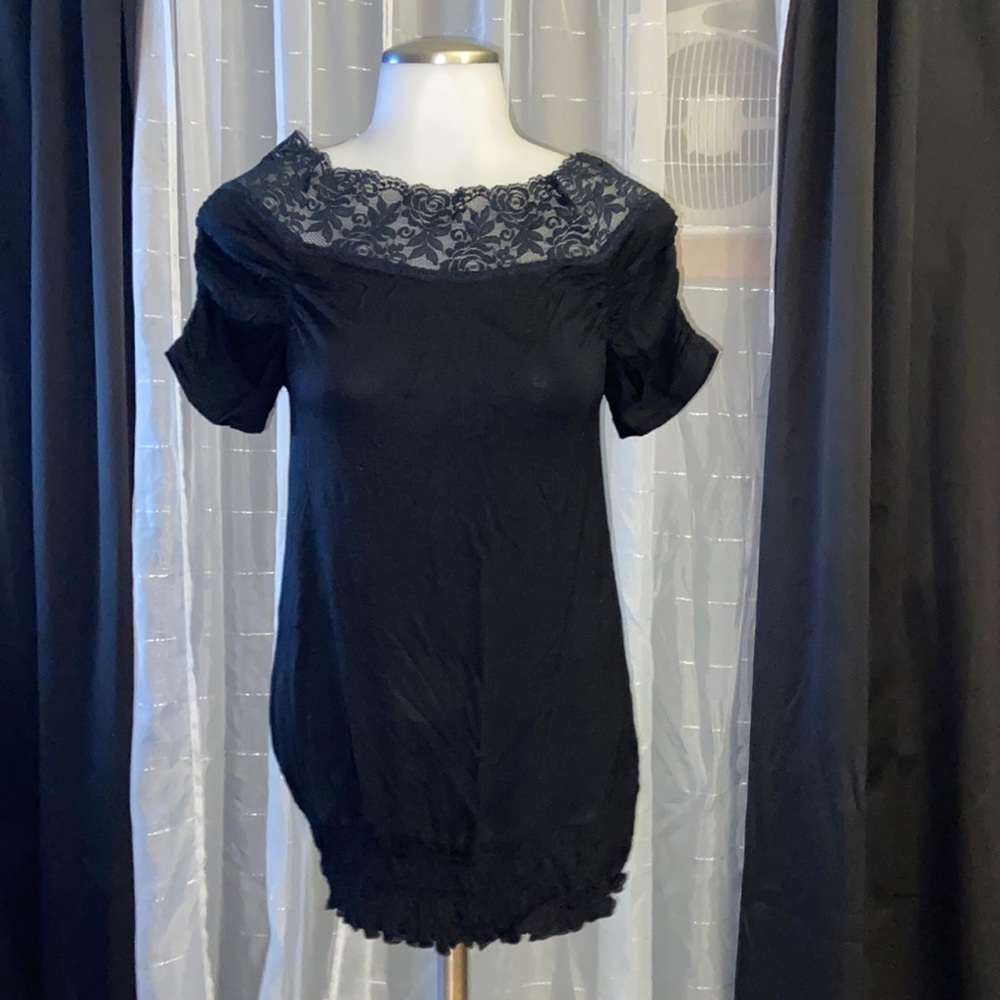 Kokimoku. Black off the shoulder blouse with lace detail.